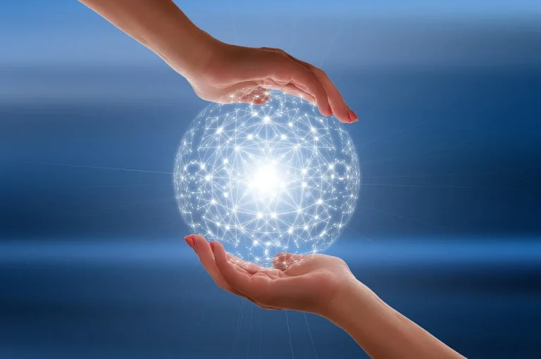 Two Hands touching a light globe